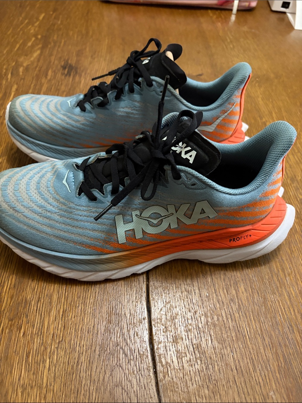 Hoka men pro fly+. Light Blue & Orange Performance Running Sneakers